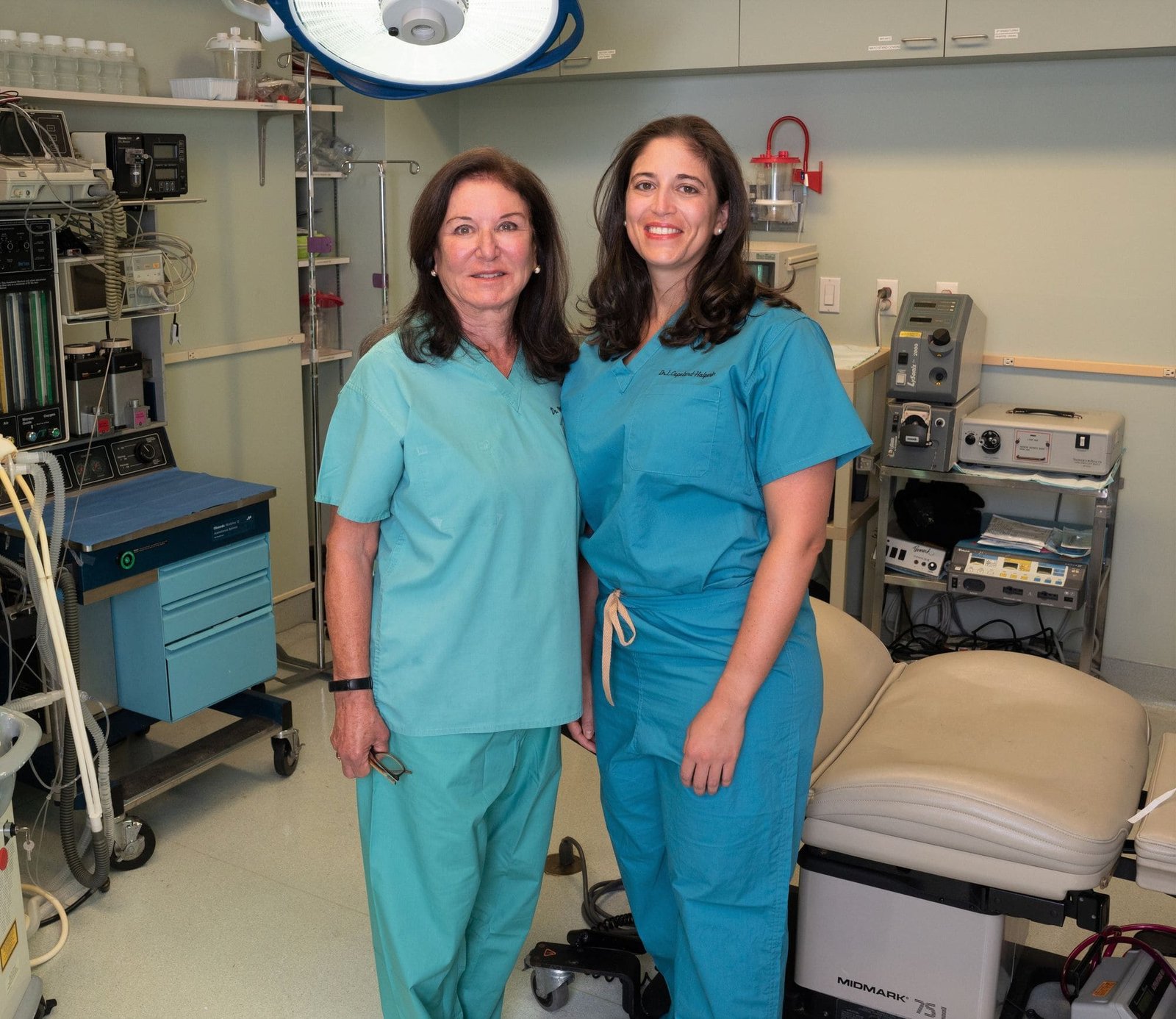 Dr. Michelle Copeland and Dr. Libby Copeland in surgical suite.